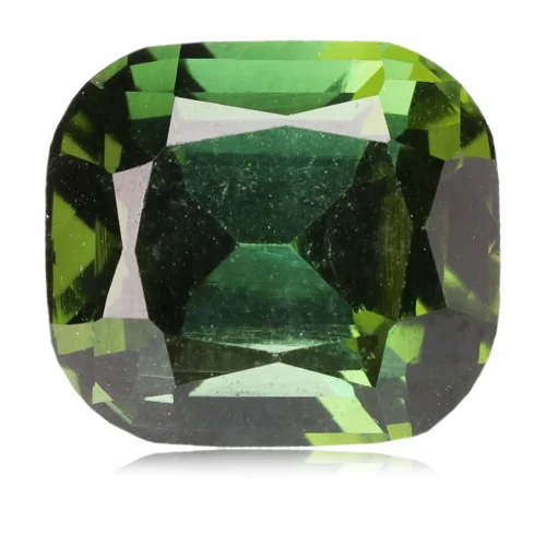 Tourmaline verte  taillée en rectangle à pans coupés, affichant un poids de 1,10 carat, de couleur verte avec une légère nuance bleue. Excellente pureté et très belle brillance pour cette gemme.