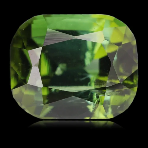 Tourmaline verte bleutée de 0,75 carat, d'origine Afghanistan. La couleur est superbe, bien répartie, verte aux 2 extrémités, et verte bleutée au centre. Très bon équilibre entre brillance et scintillement (primordial notamment pour les tourmalines).
